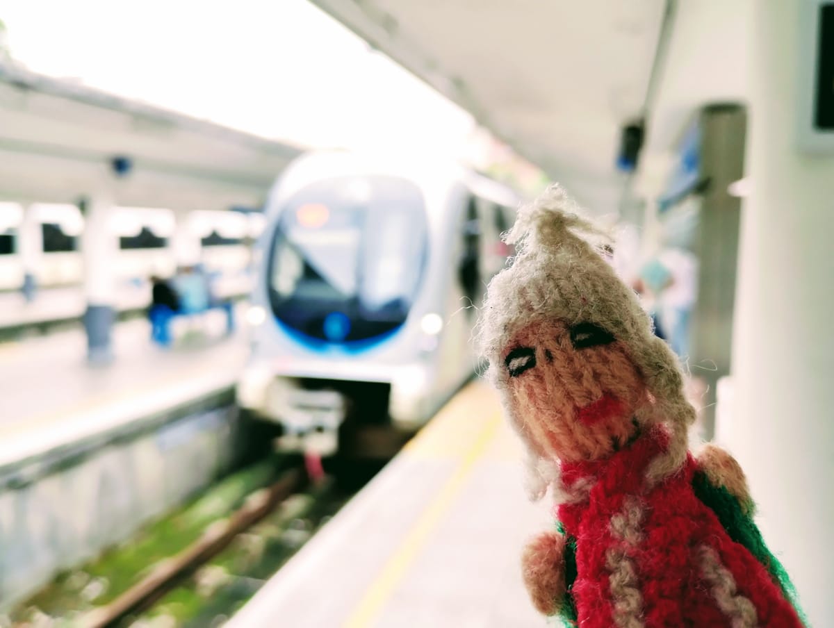 A lewd Sunday-morning finger puppet getting ready to board a Euskotren to Hendaye.